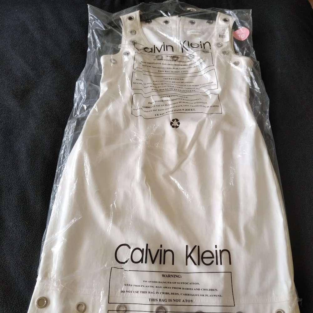 NEW CALVIN KLEIN WHITE COTTON DRESS WITH SILVER GROMMETS AT NECK & HEM - SIZE 10